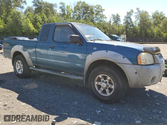 2001 Nissan Frontier SE Desert Runner with VIN 1N6ED26T31C314052, listed as a Copart auction lot 62487104 with 103,507 mi miles and Non repairable. Bid and sale history available at DreamBid. Image 4.