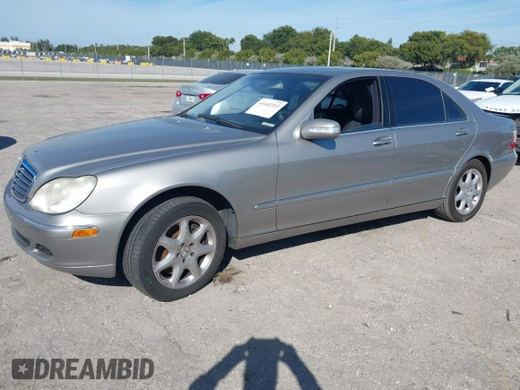2004 Mercedes-Benz S-Class 4.3L with VIN WDBNG83J14A406775, listed as a IAAI auction lot 41442333 with 77,463 mi miles. Bid and sale history available at carsss.com. Image 2.