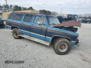 1985 GMC Suburban z VIN 1G5GC26M0FF525438, wystawiony jako Copart lot #47074415 z przebiegiem 5135 mil mil oraz Szkody całkowita. Historia ofert i sprzedaży dostępna na DreamBid. Obrazek 4.