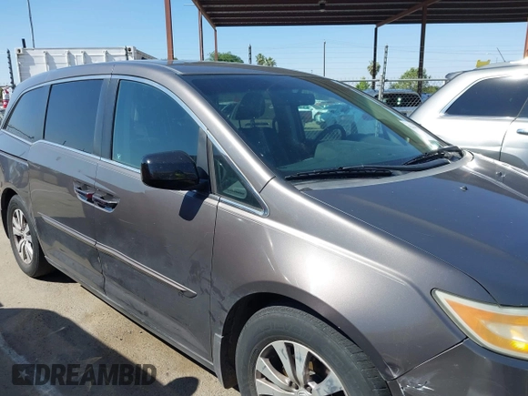 2012 Honda Odyssey EX-L with VIN 5FNRL5H65CB012428, listed as a IAAI auction lot 42164272 with 256,253 mi miles and . Bid and sale history available at carsss.com. Image 13.