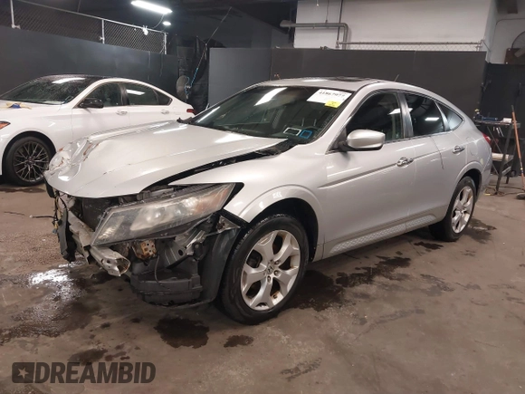 2010 Honda Crosstour EX-L z VIN 5J6TF1H52AL002179, wystawiony jako IAAI lot #41867977 z przebiegiem 145 941 mil mil oraz . Historia ofert i sprzedaży dostępna na DreamBid. Obrazek 18.