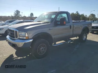 2002 Ford F-250 XL with VIN 1FTNF21L02EA83007, listed as a Copart auction lot 87880345 with 104,889 mi miles and Salvage title. Bid and sale history available at DreamBid. Image 1.