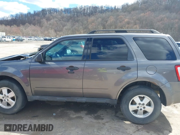 2012 Ford Escape XLT with VIN 1FMCU0D76CKC01916, listed as a IAAI auction lot 41879331 with 194,201 mi miles. Bid and sale history available at carsss.com. Image 13.