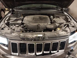 2016 Jeep Grand Cherokee Limited 75th Anniversary with VIN 1C4RJFBGXGC425705, listed as a IAAI auction lot 41779755 with 142,711 mi miles. Bid and sale history available at carsss.com. Image 10.