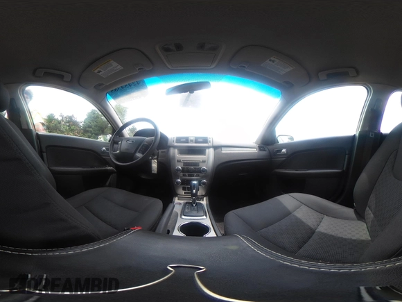 2012 Ford Fusion SE z VIN 3FAHP0HA3CR421636, wystawiony jako IAAI lot #42454385 z przebiegiem 138 282 mil mil oraz . Historia ofert i sprzedaży dostępna na DreamBid. Obrazek 19.