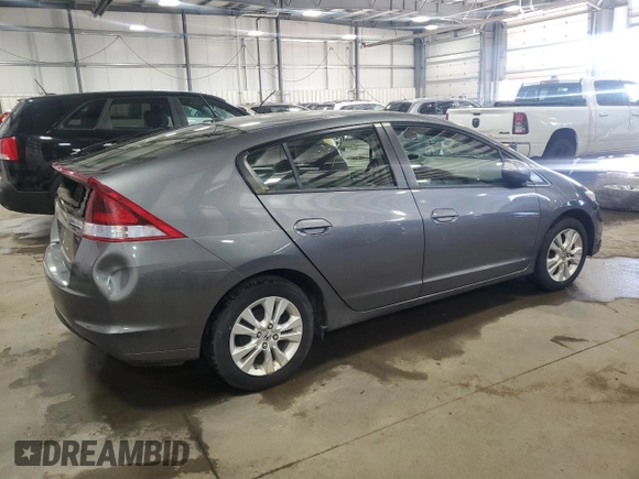 2013 Honda Insight EX with VIN JHMZE2H77DS001810, listed as a Copart auction lot 43332675 with 97,508 mi miles and Salvage title. Bid and sale history available at DreamBid. Image 3.