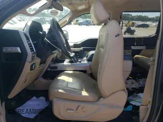 2015 Ford F-150 XLT with VIN 1FTEW1EF2FKE26597, listed as a Copart auction lot 58212385 with 123,756 mi miles and Salvage title. Bid and sale history available at DreamBid. Image 7.
