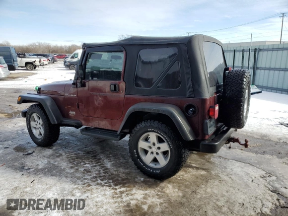2001 Jeep Wrangler SE with VIN 1J4FA29P91P308872, listed as a Copart auction lot 45676435 with 179,486 mi miles and Salvage Title. Bid and sale history available at carsss.com. Image 2.