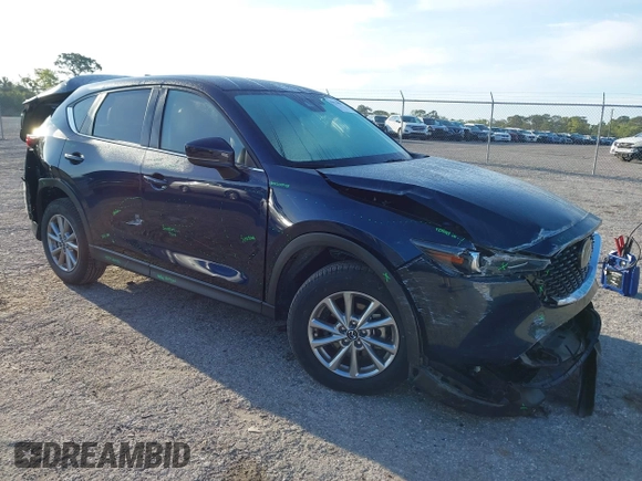 2023 Mazda CX-5 2.5 S Select Package with VIN JM3KFBBM1P0284887, listed as a IAAI auction lot 41910092 with 2,616 mi miles. Bid and sale history available at carsss.com. Image 1.