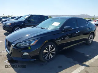 2021 Nissan Altima SV with VIN 1N4BL4DV0MN384955, listed as a IAAI auction lot 42353612 with 78,685 mi miles and . Bid and sale history available at DreamBid. Image 2.