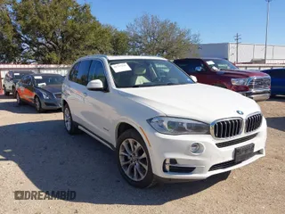 2014 BMW X5 sDrive35i with VIN 5UXKR2C53E0C01692, listed as a IAAI auction lot 41727216 with 135,985 mi miles. Bid and sale history available at carsss.com. Image 1.