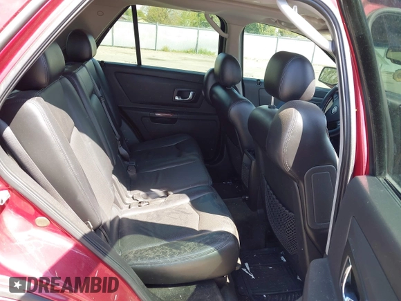 2004 Cadillac SRX with VIN 1GYEE63A640171883, listed as a IAAI auction lot 42094447 with 153,268 mi miles. Bid and sale history available at carsss.com. Image 8.