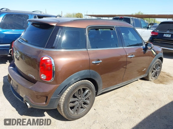 2013 MINI Countryman S ALL4 with VIN WMWZC5C58DWP30998, listed as a IAAI auction lot 42594984 with 153,792 mi miles and . Bid and sale history available at DreamBid. Image 4.