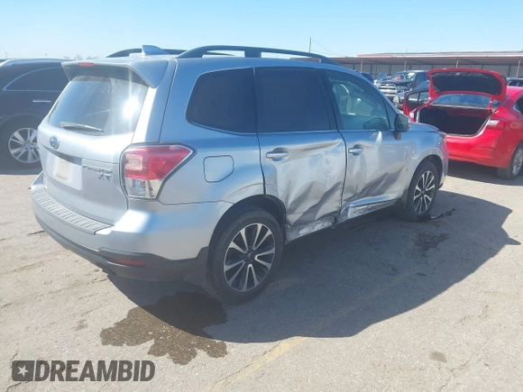 2017 Subaru Forester Touring with VIN JF2SJGTC9HH409665, listed as a IAAI auction lot 41749546 with 118,635 mi miles. Bid and sale history available at carsss.com. Image 4.