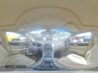 2015 Lincoln MKZ с VIN 3LN6L2JK3FR604949, выставлен на аукционе Copart как лот 57457615 с пробегом 55 118 миль миль и Списание • Salvage title. История ставок и продаж доступна на DreamBid. Изображение 14.