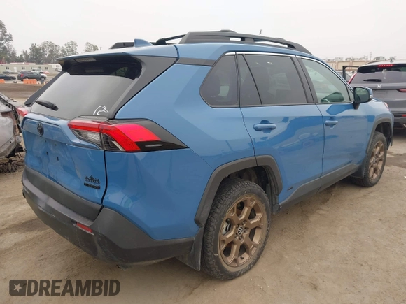 2023 Toyota RAV4 Hybrid XLE with VIN 2T3UWRFV0PW174552, listed as a IAAI auction lot 42499769 with 40,701 mi miles and . Bid and sale history available at DreamBid. Image 4.