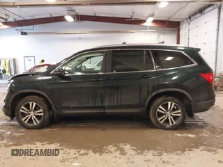 2016 Honda Pilot EX-L with VIN 5FNYF6H58GB012753, listed as a IAAI auction lot 41139479 with 175,842 mi miles and . Bid and sale history available at DreamBid. Image 14.