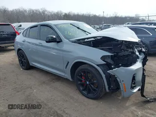 2022 BMW X4 M40i with VIN 5UX43DT09N9J56857, listed as a IAAI auction lot 41585538 with 26,408 mi miles. Bid and sale history available at carsss.com. Image 1.
