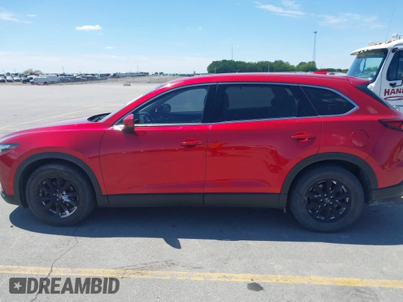 2016 Mazda CX-9 Touring with VIN JM3TCBCY5G0104504, listed as a IAAI auction lot 42314649 with 116,536 mi miles and . Bid and sale history available at DreamBid. Image 14.