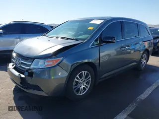 2012 Honda Odyssey EX-L with VIN 5FNRL5H64CB044075, listed as a IAAI auction lot 42094680 with 67,165 mi miles and . Bid and sale history available at carsss.com. Image 17.