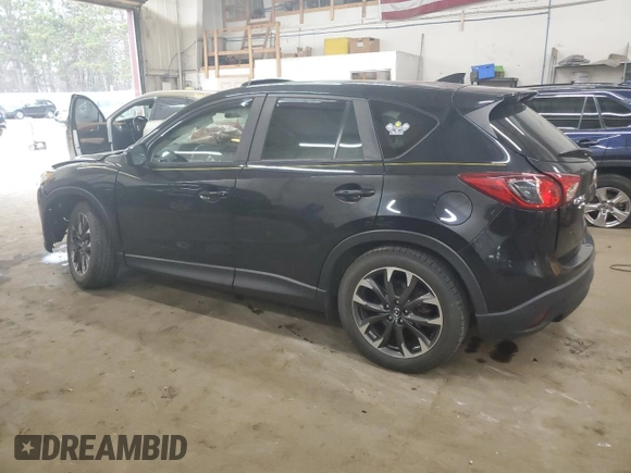 2016 Mazda CX-5 Grand Touring with VIN JM3KE4DY0G0854568, listed as a Copart auction lot 53259345 with 74,264 mi miles and Salvage Title. Bid and sale history available at carsss.com. Image 2.