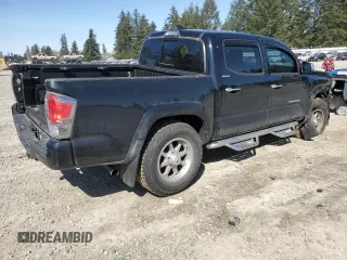 2018 Toyota Tacoma SR with VIN 3TMGZ5AN6JM163097, listed as a Copart auction lot 52633665 with 39,910 mi miles and Salvage Title. Bid and sale history available at DreamBid. Image 3.