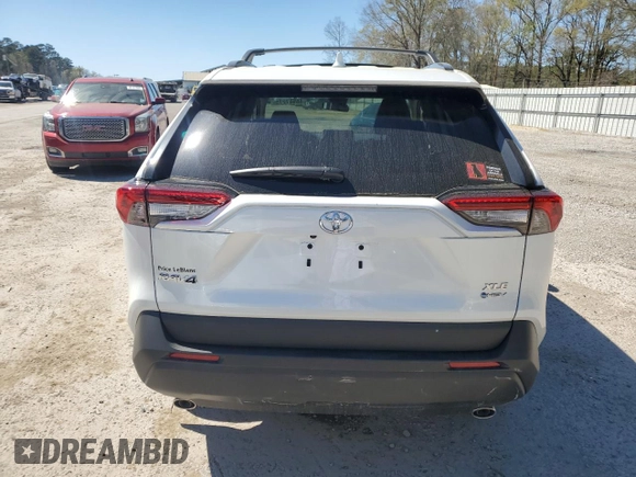2025 Toyota RAV4 Hybrid XLE Premium with VIN 2T3B6RFVXSW084227, listed as a Copart auction lot 48907275 with 1,692 mi miles and Salvage Title. Bid and sale history available at DreamBid. Image 6.