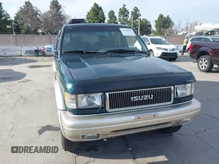 1996 Isuzu Trooper z VIN JACDJ58V4T7918002, wystawiony jako IAAI lot #41700255 z przebiegiem 203 951 mil mil oraz . Historia ofert i sprzedaży dostępna na DreamBid. Obrazek 6.