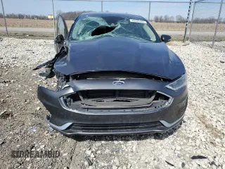2020 Ford Fusion SEL z VIN 3FA6P0CD8LR138190, wystawiony jako Copart lot #49266445 z przebiegiem 145 381 mil mil oraz Szkoda całkowita • Salvage title. Historia ofert i sprzedaży dostępna na DreamBid. Obrazek 5.