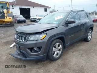2018 Jeep Compass Latitude with VIN 3C4NJDBB8JT307154, listed as a IAAI auction lot 42056744 with 94,454 mi miles and . Bid and sale history available at DreamBid. Image 2.