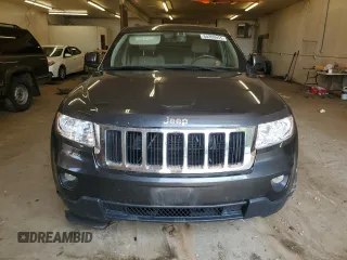 2011 Jeep Grand Cherokee Laredo with VIN 1J4RR4GG6BC641138, listed as a Copart auction lot 60209955 with 218,235 mi miles and Clean title. Bid and sale history available at DreamBid. Image 5.