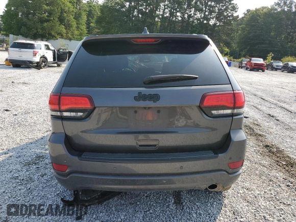 2018 Jeep Grand Cherokee Altitude with VIN 1C4RJEAG4JC145023, listed as a Copart auction lot 59001735 with 127,627 mi miles and Salvage title. Bid and sale history available at DreamBid. Image 6.