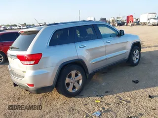 2012 Jeep Grand Cherokee Limited with VIN 1C4RJEBGXCC354137, listed as a IAAI auction lot 40844812 with 110,699 mi miles. Bid and sale history available at carsss.com. Image 4.