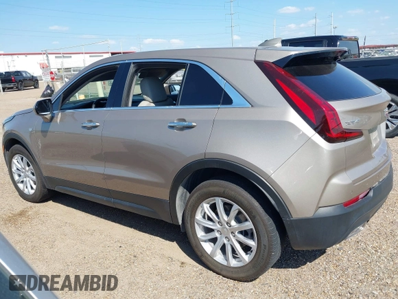 2023 Cadillac XT4 FWD Luxury with VIN 1GYAZAR4XPF116698, listed as a IAAI auction lot 40594015 with 18,368 mi miles. Bid and sale history available at carsss.com. Image 14.