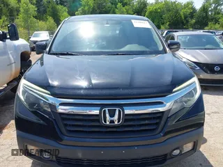 2018 Honda Ridgeline RTL-T with VIN 5FPYK3F67JB013171, listed as a IAAI auction lot 42498827 with 124,415 mi miles and . Bid and sale history available at DreamBid. Image 13.