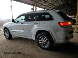 2017 Jeep Grand Cherokee Overland with VIN 1C4RJFCG2HC834328, listed as a Copart auction lot 45199855 with 87,061 mi miles and Salvage Title. Bid and sale history available at carsss.com. Image 2.