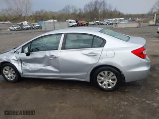 2012 Honda Civic Sdn LX with VIN 19XFB2F50CE353837, listed as a IAAI auction lot 41961162 with 140,583 mi miles. Bid and sale history available at carsss.com. Image 15.