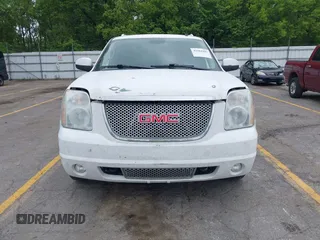 2011 GMC Yukon XL Denali z VIN 1GKS2MEF2BR190877, wystawiony jako IAAI lot #42364202 z przebiegiem 160 063 mil mil oraz . Historia ofert i sprzedaży dostępna na DreamBid. Obrazek 12.