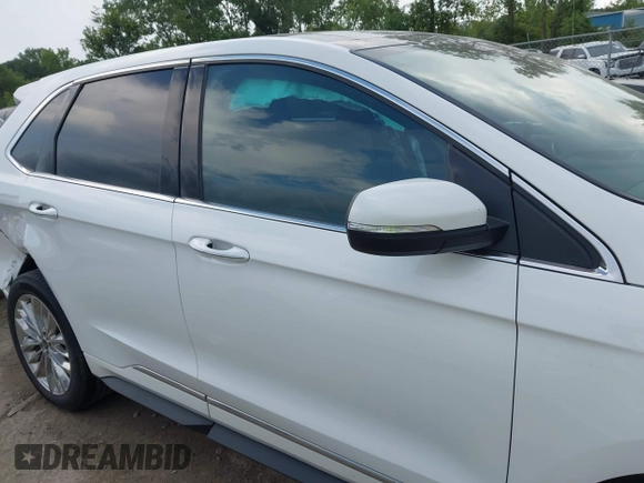 2021 Ford Edge Titanium with VIN 2FMPK4K96MBA18546, listed as a IAAI auction lot 42584326 with 65,214 mi miles and . Bid and sale history available at DreamBid. Image 13.