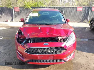 2016 Ford Focus SE with VIN 1FADP3F29GL347574, listed as a IAAI auction lot 41975094 with 76,147 mi miles. Bid and sale history available at carsss.com. Image 6.