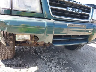 1999 Isuzu Trooper S with VIN JACDJ58X1X7917154, listed as a IAAI auction lot 42632311 with 200,023 mi miles and . Bid and sale history available at DreamBid. Image 15.