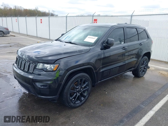 2018 Jeep Grand Cherokee Laredo with VIN 1C4RJFAG7JC468391, listed as a IAAI auction lot 42010443 with 91,585 mi miles and . Bid and sale history available at DreamBid. Image 2.
