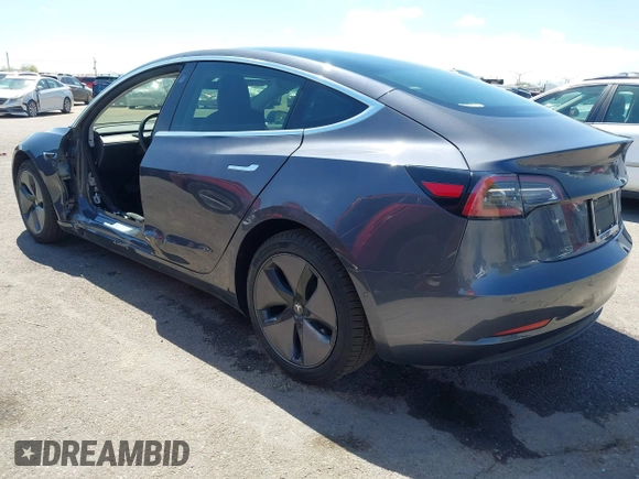 2019 Tesla Model 3 Long Range with VIN 5YJ3E1EB9KF386047, listed as a IAAI auction lot 42215362 with 41,246 mi miles and . Bid and sale history available at DreamBid. Image 3.