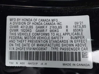 2022 Honda Civic Sedan Touring with VIN 2HGFE1F91NH308547, listed as a IAAI auction lot 41882514 with 39,249 mi miles. Bid and sale history available at carsss.com. Image 9.