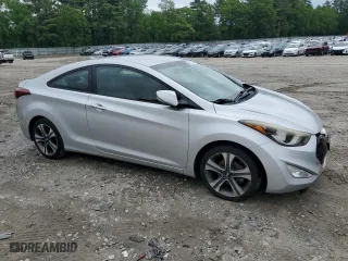 2014 Hyundai Elantra Coupe with VIN KMHDH6AH5EU026445, listed as a Copart auction lot 56123894 with 133,118 mi miles and Non Repairable. Bid and sale history available at carsss.com. Image 4.