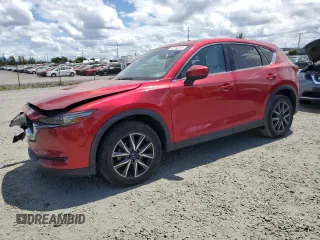 2018 Mazda CX-5 Grand Touring с VIN JM3KFBDMXJ0428134, выставлен на аукционе Copart как лот 60746215 с пробегом 77 369 миль миль и Списание • Salvage title. История ставок и продаж доступна на DreamBid. Изображение 1.