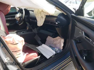 2023 Mazda 3 S Carbon Edition with VIN 3MZBPACM5PM376545, listed as a IAAI auction lot 42404054 with Not provided miles and . Bid and sale history available at DreamBid. Image 5.