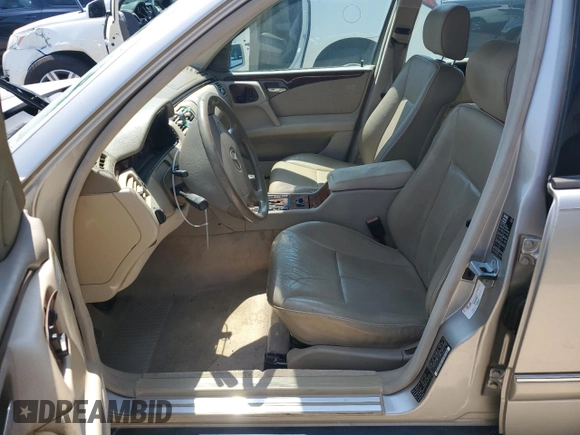 1999 Mercedes-Benz E-Class with VIN WDBJF65H2XA796208, listed as a Copart auction lot 62738904 with 156,283 mi miles and Salvage Title. Bid and sale history available at carsss.com. Image 7.