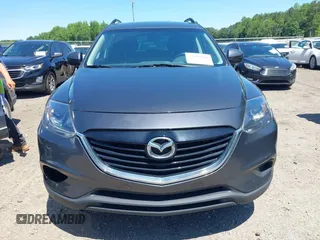2014 Mazda CX-9 Touring with VIN JM3TB2CA0E0438247, listed as a IAAI auction lot 42190891 with 142,117 mi miles and . Bid and sale history available at carsss.com. Image 6.