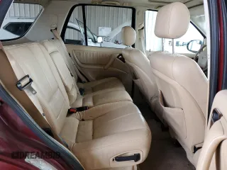 2001 Mercedes-Benz M 320/430/500 z VIN 4JGAB54E81A259134, wystawiony jako Copart lot #55499565 z przebiegiem 294 315 mil mil oraz Szkody całkowita. Historia ofert i sprzedaży dostępna na DreamBid. Obrazek 11.